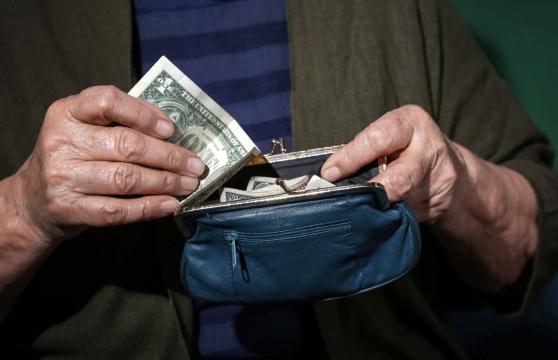 Hands handling money