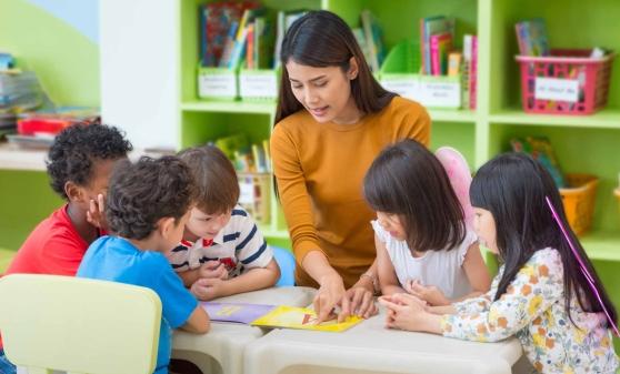 A young teacher with students