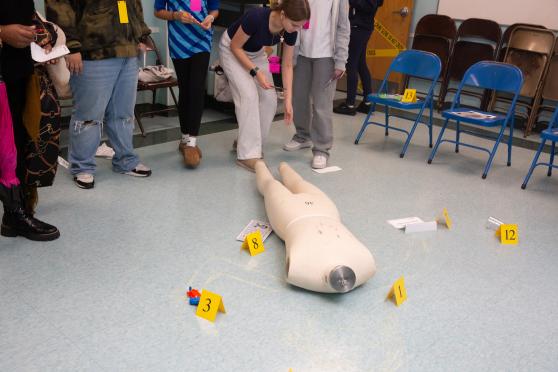 Students demonstrate techniques they learned in the crime scene investigation intensive.