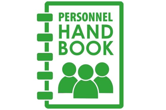 Spiral Notebook that says Personnel Handbook