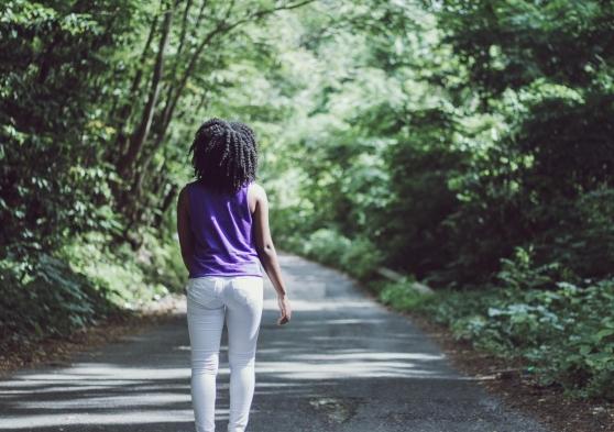 woman walking forest generic 