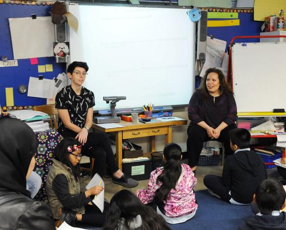 Teachers Alison Dempsey (left) and Maria Koutras listen as parents of the childr