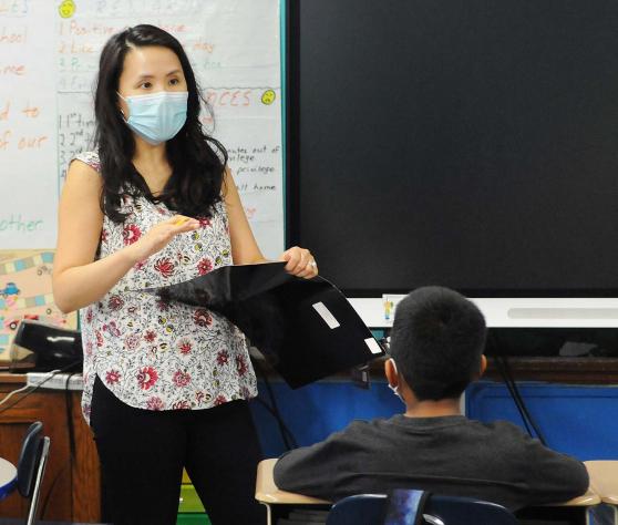 A teacher teaching a class