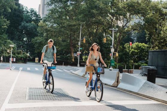 people-biking-nyc-park-spring-generic