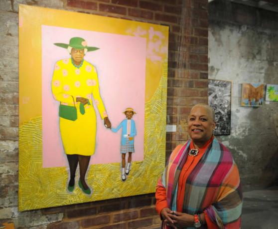 Artist with painting