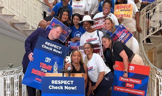 Paraprofessionals take a selfie at City Hall 