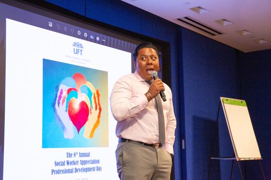 Chapter Leader Raul Garcia speaks on stage at the 2024 Social Worker Appreciation Day 