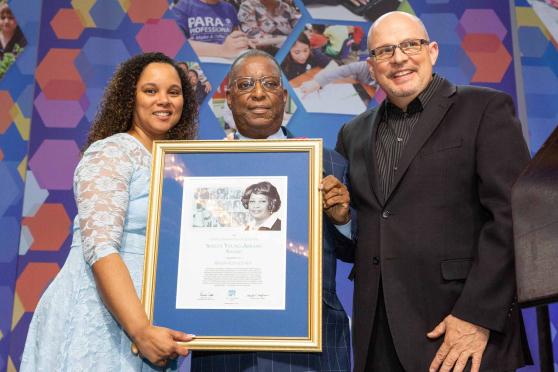 Reginald Colvin accepts his award