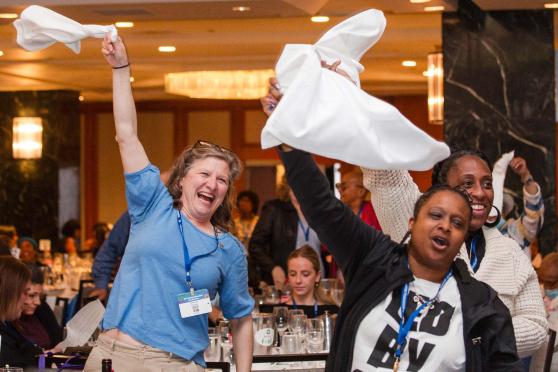 UFT members cheer the speakers at the union’s annual spring gathering of educators.