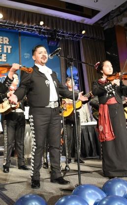 Schools Chancellor Richard Carranza serenades the luncheon attendees.