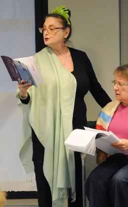 “The Lady” is performed by Helaine Bernard (left) as the Statue of Liberty and J