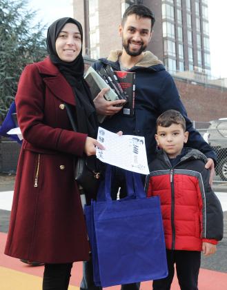 A family in attendance at a Brooklyn family UFT event. 