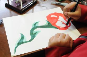 Flower in process of being painted
